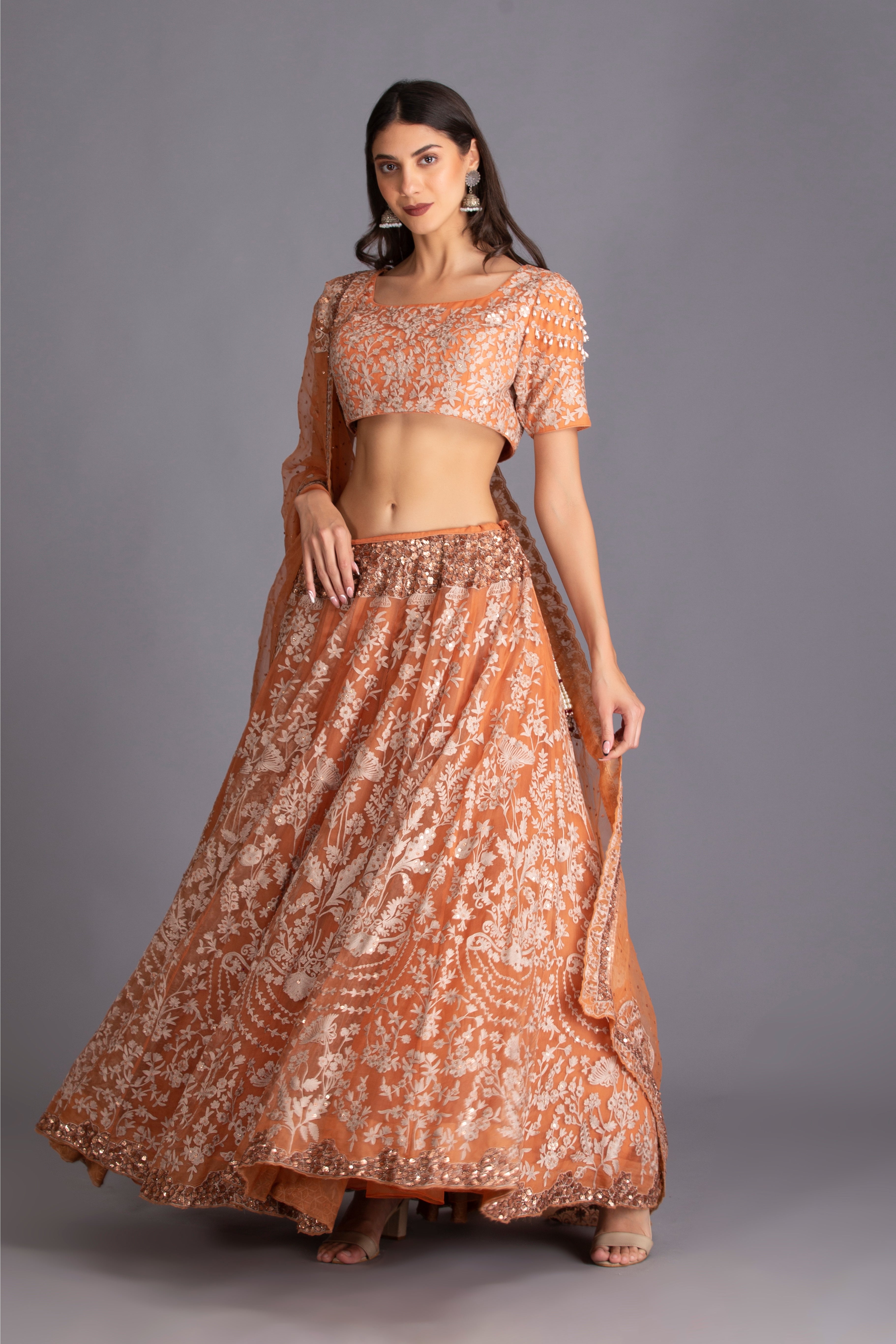 Rust Orange Hand Embroidered Kalidar Lehenga Set